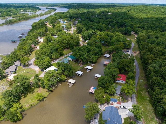 26406 Waterview Dr, Warsaw, MO 65355 - aerial overview of property's location with a nearby body of water and a forest