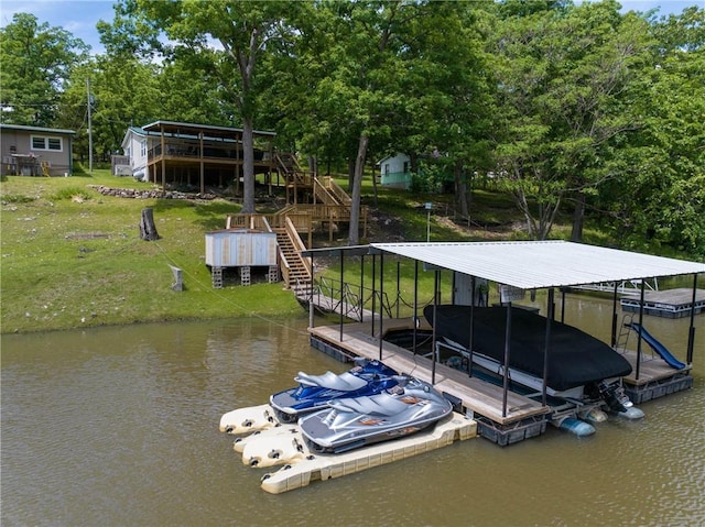 26406 Waterview Dr, Warsaw, MO 65355 - dock area featuring stairs, a water view, view of scattered trees, boat lift, and a lawn