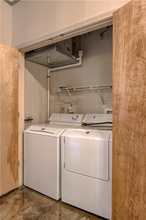 360 W Pershing Rd Unit 250, Kansas City, MO 64108 - washroom featuring separate washer and dryer