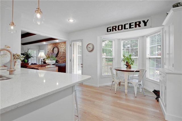 12000 Overbrook Rd, Leawood, KS 66209 - kitchen with light wood-style flooring, baseboards, plenty of natural light, a sink, and recessed lighting