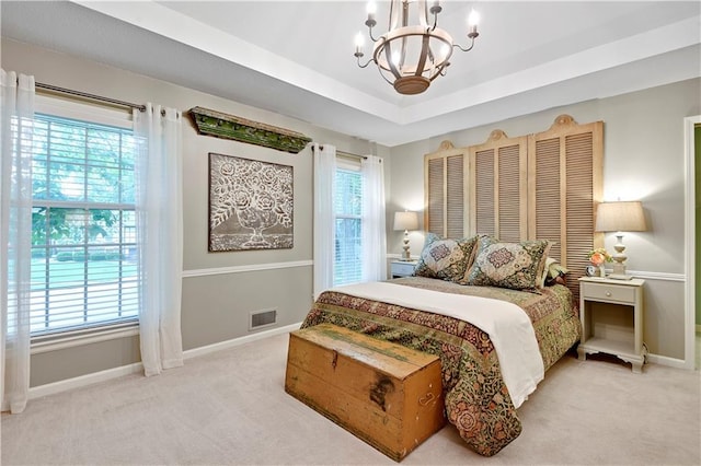 12000 Overbrook Rd, Leawood, KS 66209 - bedroom featuring a chandelier, light colored carpet, baseboards, and a tray ceiling