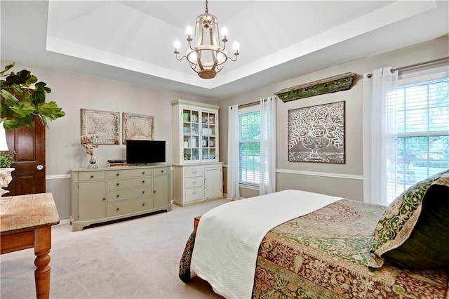 12000 Overbrook Rd, Leawood, KS 66209 - bedroom featuring a chandelier, a raised ceiling, and light colored carpet