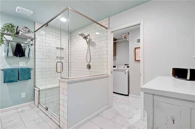 12000 Overbrook Rd, Leawood, KS 66209 - bathroom featuring marble look tile flooring, a stall shower, and baseboards