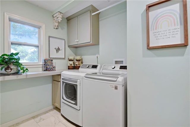 12000 Overbrook Rd, Leawood, KS 66209 - laundry area with independent washer and dryer, cabinet space, and light marble finish floors