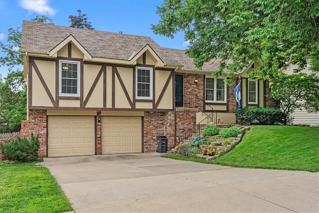 14613 S Locust St, Olathe, KS 66062 - english style home featuring stucco siding, a garage, driveway, and brick siding