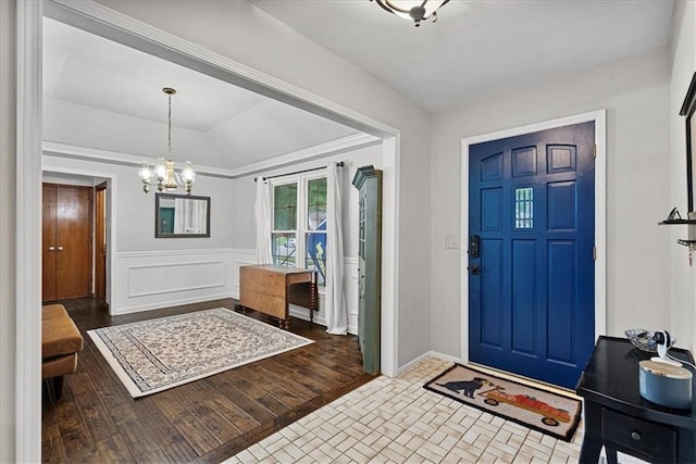 14613 S Locust St, Olathe, KS 66062 - entryway with a chandelier and baseboards