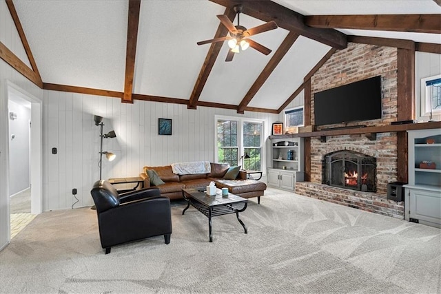 14613 S Locust St, Olathe, KS 66062 - living room featuring carpet flooring, a ceiling fan, a fireplace, and wooden walls