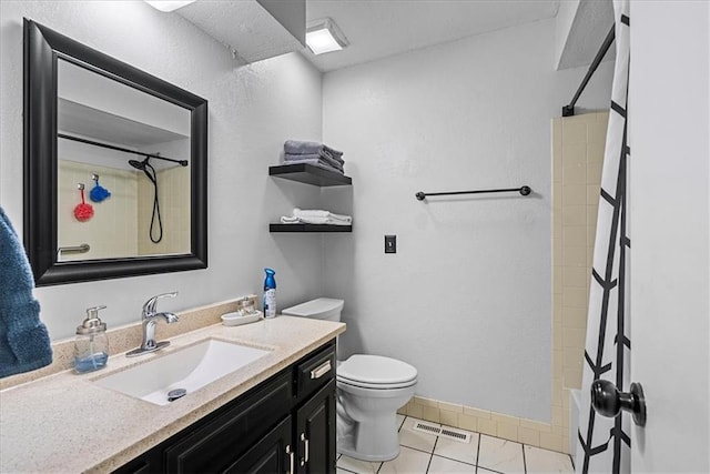 14613 S Locust St, Olathe, KS 66062 - bathroom featuring a shower with curtain, vanity, and tile patterned floors