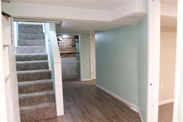 816 S Huttig Ave, Independence, MO 64053 - stairway with baseboards and wood finished floors