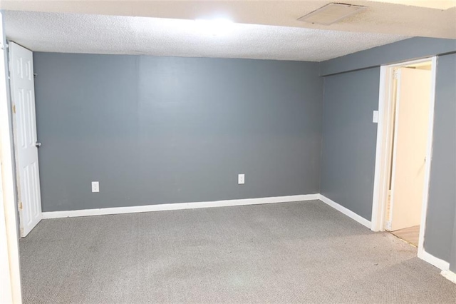 816 S Huttig Ave, Independence, MO 64053 - unfurnished bedroom with carpet floors, baseboards, and a textured ceiling