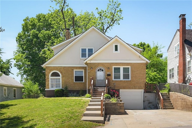 314 N Crysler Ave, Independence, MO 64050 - view of front of home featuring stairs, brick siding, an attached garage, and concrete driveway