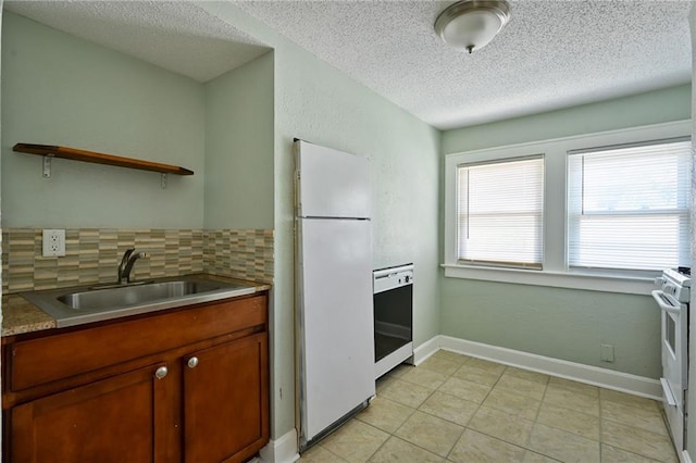 314 N Crysler Ave, Independence, MO 64050 - kitchen featuring white appliances, a sink, open shelves, a textured ceiling, and backsplash