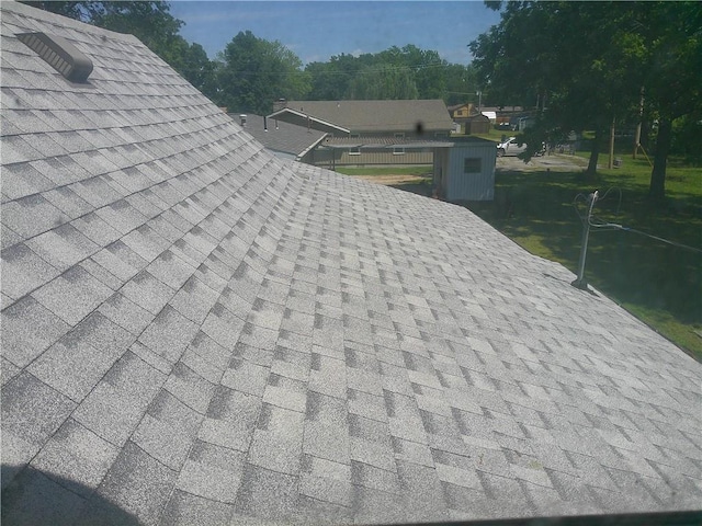 220 W State St, Erie, KS 66733 - exterior view of a shingled roof