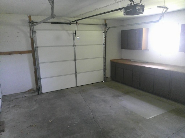220 W State St, Erie, KS 66733 - garage with a garage door opener
