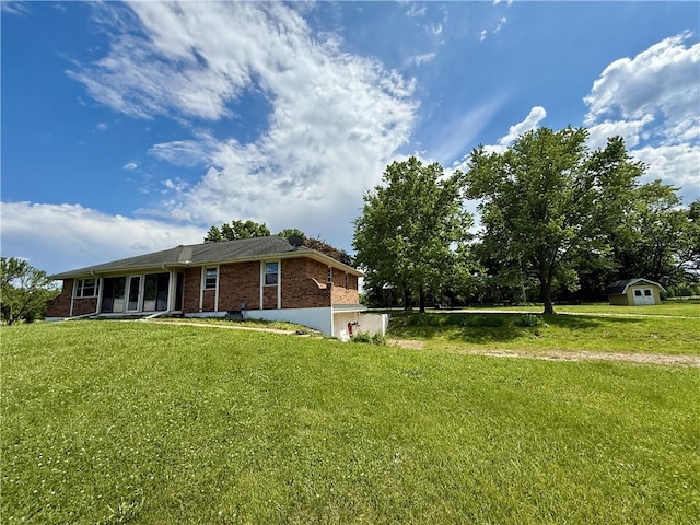 450 SW 725th Rd, Chilhowee, MO 64733 - view of front of home featuring brick siding and a front lawn