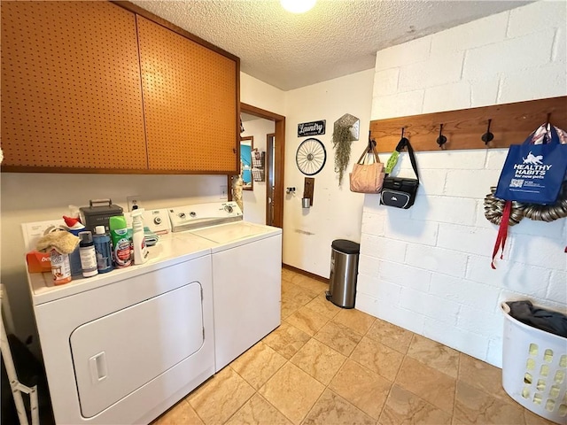 450 SW 725th Rd, Chilhowee, MO 64733 - washroom featuring washing machine and clothes dryer, concrete block wall, and a textured ceiling