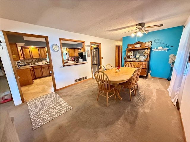 450 SW 725th Rd, Chilhowee, MO 64733 - dining area with light carpet, ceiling fan, and baseboards