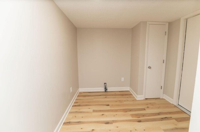 22102 E 291st St, Harrisonville, MO 64701 - unfurnished room with light wood-type flooring and baseboards