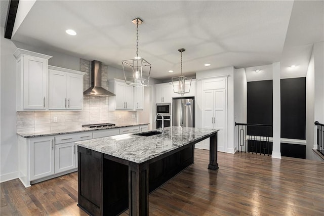 8316 NW 90th St, Kansas City, MO 64153 - kitchen with wall chimney exhaust hood, stainless steel appliances, a sink, recessed lighting, and backsplash