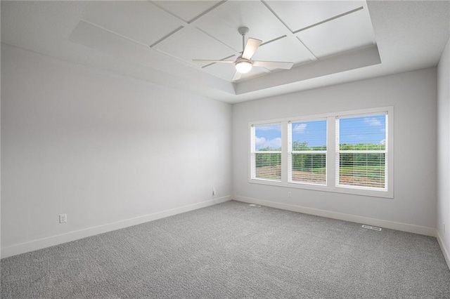8316 NW 90th St, Kansas City, MO 64153 - carpeted empty room featuring baseboards and a raised ceiling