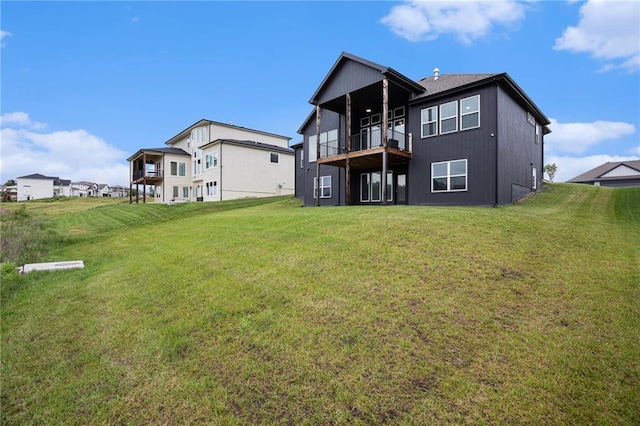 8316 NW 90th St, Kansas City, MO 64153 - back of house with a balcony and a lawn