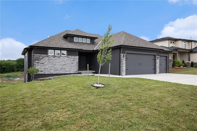 8316 NW 90th St, Kansas City, MO 64153 - prairie-style house with a garage, stone siding, driveway, a front yard, and a shingled roof