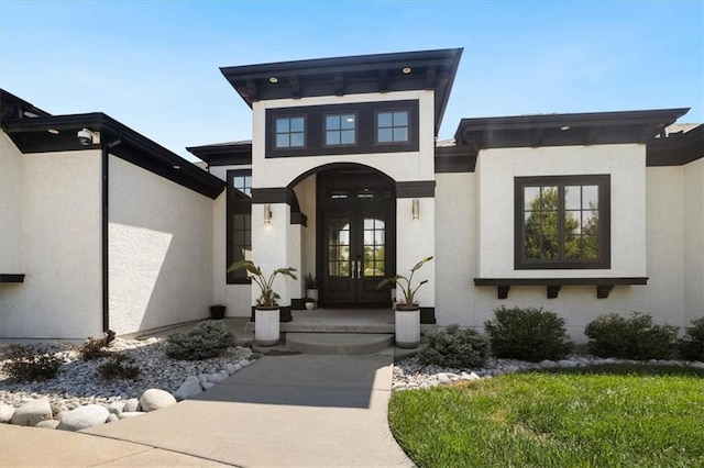 8605 NE Shl Creek Pkwy, Kansas City, MO 64157 - doorway to property featuring french doors and stucco siding