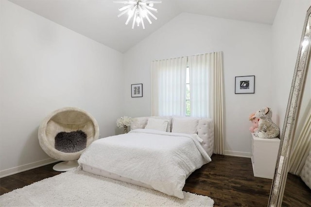 8605 NE Shl Creek Pkwy, Kansas City, MO 64157 - bedroom featuring a chandelier, vaulted ceiling, dark wood-type flooring, and baseboards