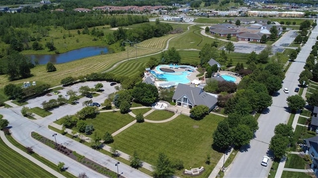 8605 NE Shl Creek Pkwy, Kansas City, MO 64157 - aerial overview of property's location with a nearby body of water and a pool