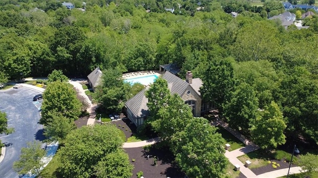 8605 NE Shl Creek Pkwy, Kansas City, MO 64157 - view of subject property featuring a forest and a pool