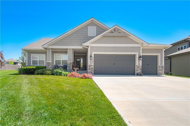 25383 W 144th Ct, Olathe, KS 66061 - craftsman inspired home with a garage, concrete driveway, and stone siding
