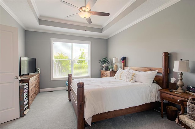 25383 W 144th Ct, Olathe, KS 66061 - bedroom with a raised ceiling, light carpet, crown molding, baseboards, and ceiling fan