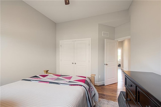 25383 W 144th Ct, Olathe, KS 66061 - bedroom with wood finished floors, a closet, baseboards, and a ceiling fan