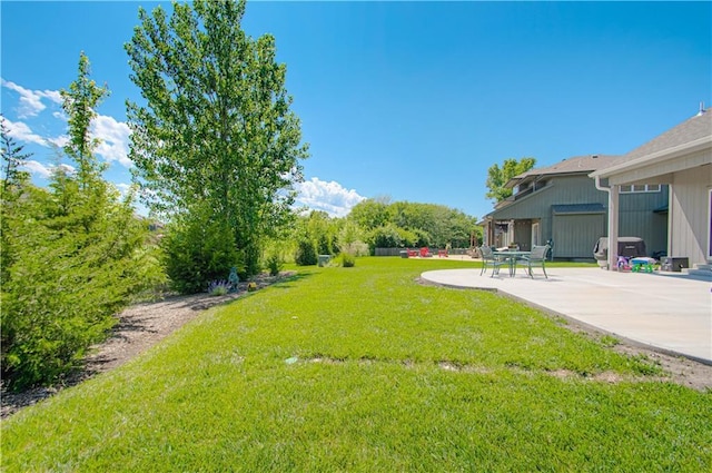 25383 W 144th Ct, Olathe, KS 66061 - view of green lawn with a patio
