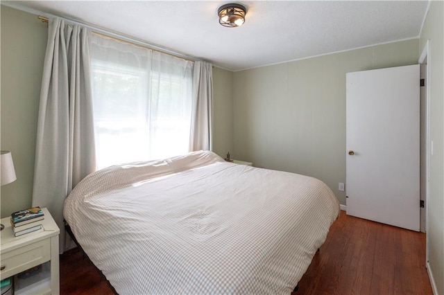 8401 England St, Overland Park, KS 66212 - bedroom featuring wood finished floors
