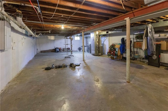 8401 England St, Overland Park, KS 66212 - basement with electric panel and heating unit