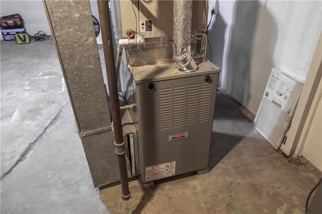 8401 England St, Overland Park, KS 66212 - utility room featuring heating unit
