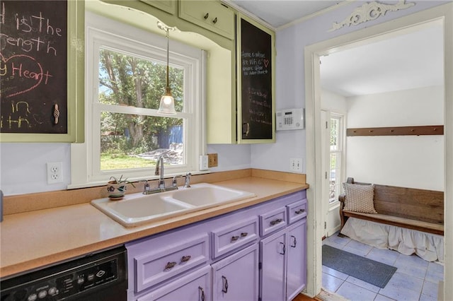 10916 Grandview Rd, Kansas City, MO 64137 - kitchen featuring black dishwasher, a sink, light countertops, and healthy amount of natural light