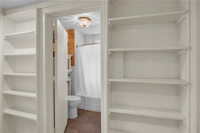 10916 Grandview Rd, Kansas City, MO 64137 - bathroom with toilet, shower / bathtub combination with curtain, and a chandelier