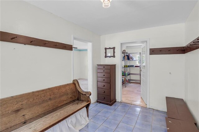10916 Grandview Rd, Kansas City, MO 64137 - mudroom with tile patterned flooring