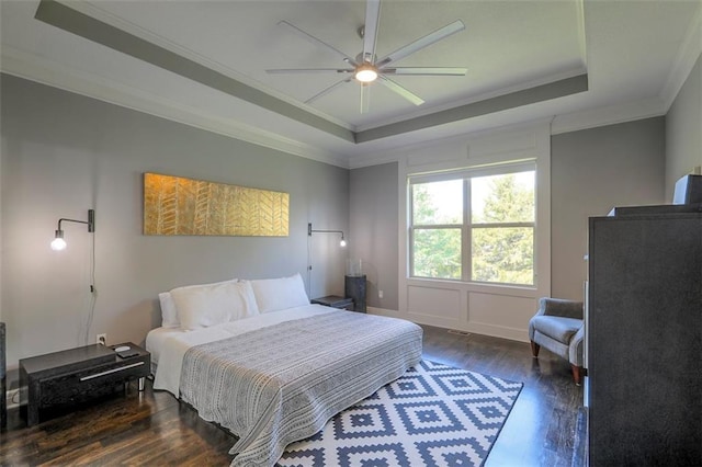 1644 Woodland Shores Cir, Lees Summit, MO 64086 - bedroom with a raised ceiling, dark wood-style floors, crown molding, and ceiling fan