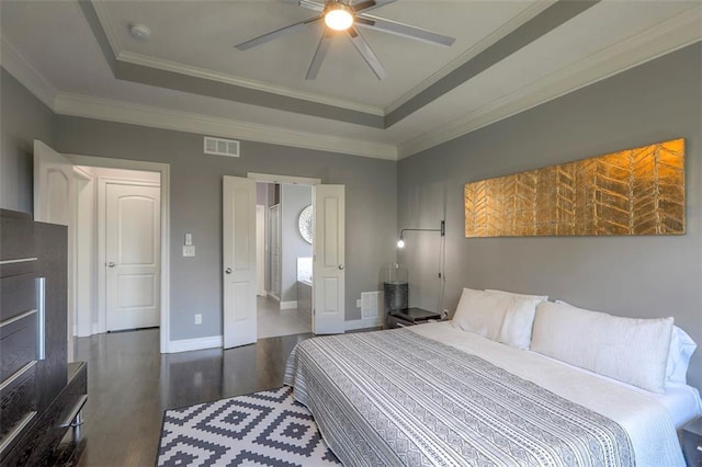 1644 Woodland Shores Cir, Lees Summit, MO 64086 - bedroom featuring a tray ceiling, wood finished floors, ornamental molding, baseboards, and ceiling fan