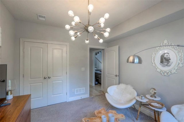 1644 Woodland Shores Cir, Lees Summit, MO 64086 - sitting room featuring baseboards, a chandelier, and carpet floors