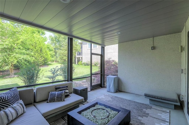 1644 Woodland Shores Cir, Lees Summit, MO 64086 - sunroom featuring an outdoor living space with a fire pit