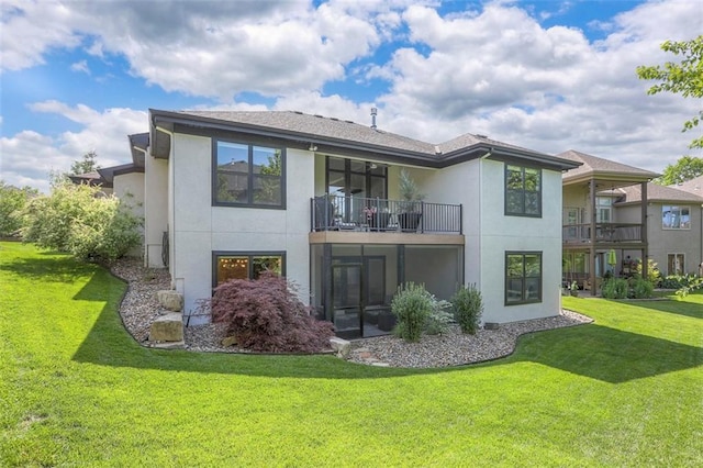 1644 Woodland Shores Cir, Lees Summit, MO 64086 - back of property featuring a balcony, stucco siding, and a lawn