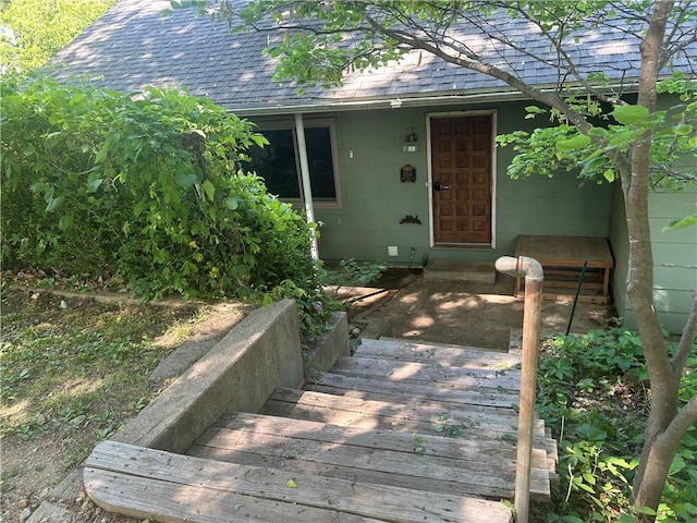 5365 Saratoga Dr, Mclouth, KS 66054 - doorway to property with roof with shingles