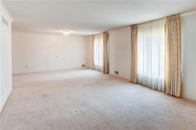 917 Country Club Dr, Butler, MO 64730 - carpeted spare room featuring plenty of natural light