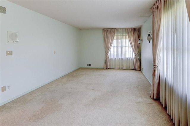 917 Country Club Dr, Butler, MO 64730 - spare room featuring light carpet