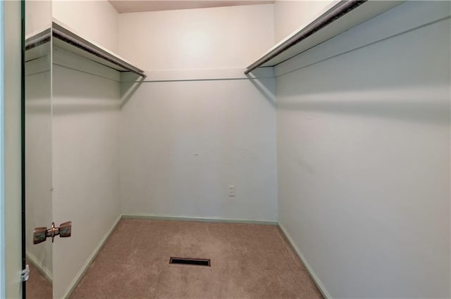 917 Country Club Dr, Butler, MO 64730 - spacious closet featuring carpet