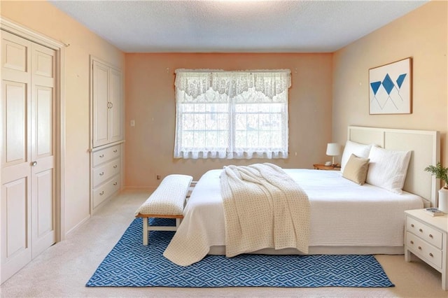 917 Country Club Dr, Butler, MO 64730 - bedroom with light colored carpet and a textured ceiling